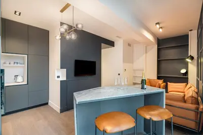 Télévision ou salle de divertissement dans l'établissement RESIDENCE MONTEFIORE