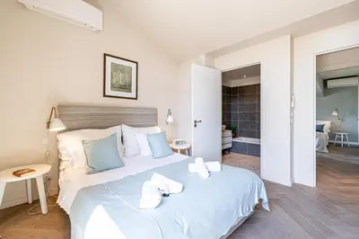 Un ou plusieurs lits dans un hébergement de l'établissement LE BOREAL penthouse avec terrasse et vue panoramique spectaculaire sur la ville