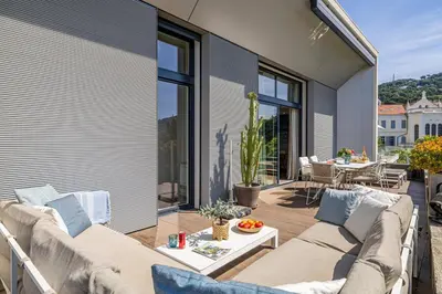 Coin salon dans l'établissement LE BOREAL penthouse avec terrasse et vue panoramique spectaculaire sur la ville