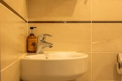 Salle de bains dans l'établissement Palm Beach - swimming pool - beach at few steps