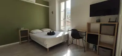 Un ou plusieurs lits dans un hébergement de l'établissement APPARTEMENT CANNES MONTFLEURY