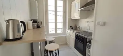 Cuisine ou kitchenette dans l'établissement APPARTEMENT CANNES MONTFLEURY