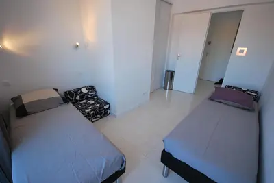 Un ou plusieurs lits dans un hébergement de l'établissement T3 Pte Croisette Vue mer Plage à 100m