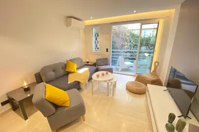 Coin salon dans l'établissement Renovated 2 bedrooms - Boulevard de la Croisette