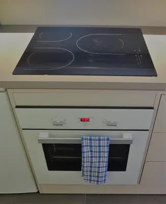 Cuisine ou kitchenette dans l'établissement Apt Golfe Juan - 5min des plages - Parking privée - Piscine Rooftop