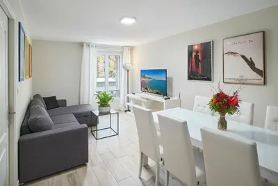 Télévision ou salle de divertissement dans l'établissement Apparthotel des Congrès et Festivals