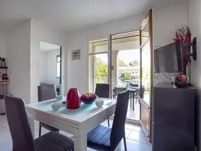 Coin salon dans l'établissement Apartment La Calmeraie by Interhome