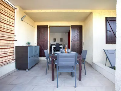 Coin salon dans l'établissement Apartment La Calmeraie by Interhome