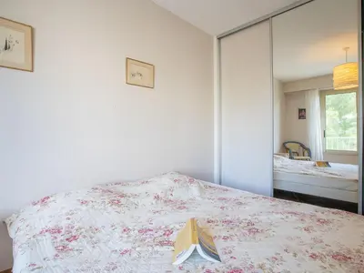 Un ou plusieurs lits dans un hébergement de l'établissement Apartment Les Pervenches by Interhome