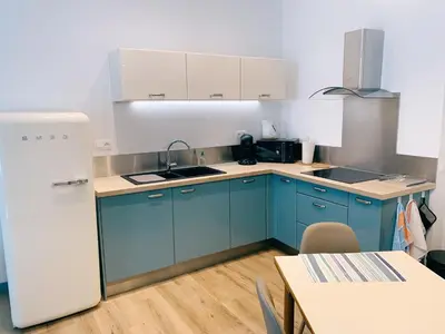 Cuisine ou kitchenette dans l'établissement Au cœur du vieil Antibes