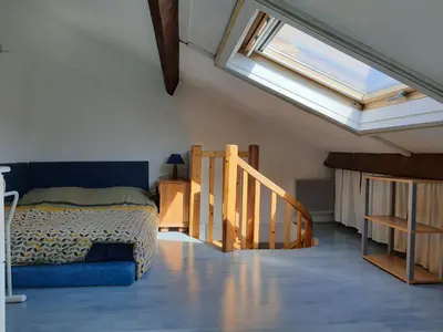 Un ou plusieurs lits dans un hébergement de l'établissement Beau duplex lumineux avec aperçu mer