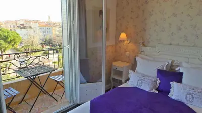 Un ou plusieurs lits dans un hébergement de l'établissement Hotel Relais Du Postillon