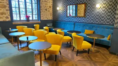Coin salon dans l'établissement Hotel Relais Du Postillon