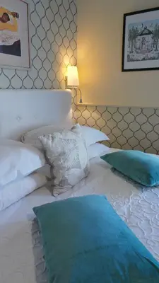 Un ou plusieurs lits dans un hébergement de l'établissement Hotel Relais Du Postillon