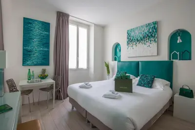 Un ou plusieurs lits dans un hébergement de l'établissement O Carré Croisette Cannes