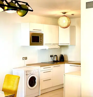 Cuisine ou kitchenette dans l'établissement Carlton Riviera
