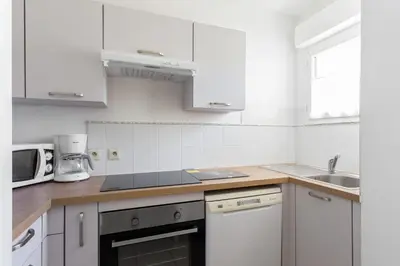 Cuisine ou kitchenette dans l'établissement Maison La Fontonne - Welkeys