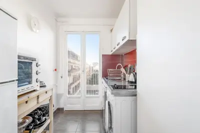 Cuisine ou kitchenette dans l'établissement Appartement Corail - Welkeys