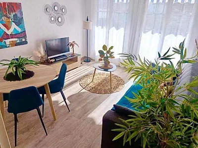 Coin salon dans l'établissement Terrasse plein sud, deux chambres doubles