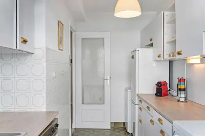 Cuisine ou kitchenette dans l'établissement Majestic Apartment