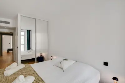 Un ou plusieurs lits dans un hébergement de l'établissement Gold Apartment