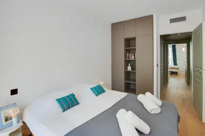 Un ou plusieurs lits dans un hébergement de l'établissement Gold Apartment