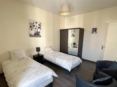Un ou plusieurs lits dans un hébergement de l'établissement Cannes Centre, 3 Chambres, Plage et La Croisette à 50m