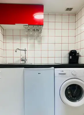 Cuisine ou kitchenette dans l'établissement Red Calmette