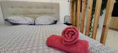 Un ou plusieurs lits dans un hébergement de l'établissement Studio design - 5 min à pied du Palais & plages