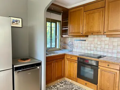 Cuisine ou kitchenette dans l'établissement Les Ondes - Terrasse RdC Villa Calme Parking Proche Plage