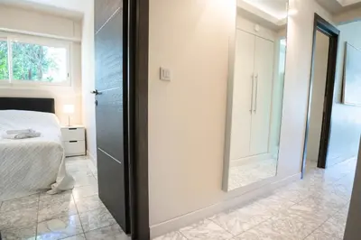 Un ou plusieurs lits dans un hébergement de l'établissement 2-Bedroom Apartment Pointe Croisette Peaceful Walk to the Beach