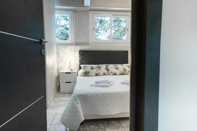 Un ou plusieurs lits dans un hébergement de l'établissement 2-Bedroom Apartment Pointe Croisette Peaceful Walk to the Beach