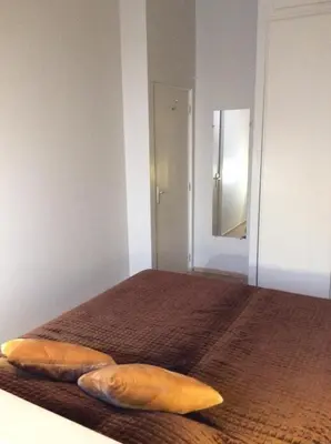 Un ou plusieurs lits dans un hébergement de l'établissement Lecerf apartment