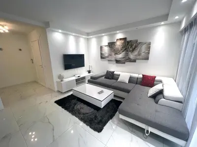 Télévision ou salle de divertissement dans l'établissement Appartements de Standing Cannes Centre
