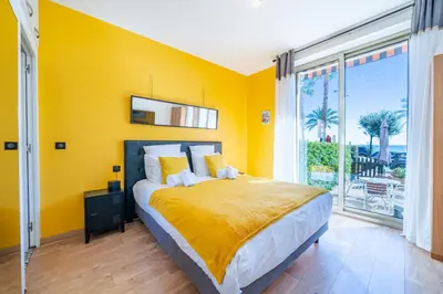 Un ou plusieurs lits dans un hébergement de l'établissement Studio de la plage - Mer, Terrasse et garage