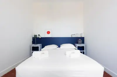 Un ou plusieurs lits dans un hébergement de l'établissement IMMOGROOM - Bright flat - near shops - CONGRESSBEACHES