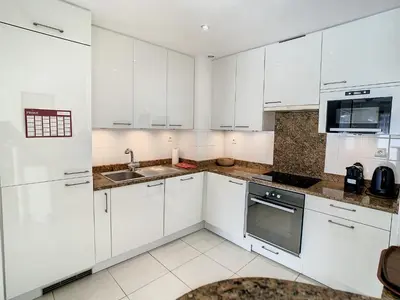 Cuisine ou kitchenette dans l'établissement Studio luxueux et spacieux avec terrasse