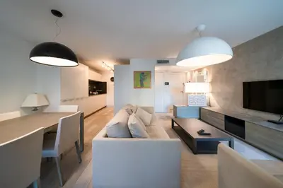 Télévision ou salle de divertissement dans l'établissement Carlton Riviera Cannes