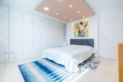 Un ou plusieurs lits dans un hébergement de l'établissement 2-Bedroom apartment in Grand Hotel