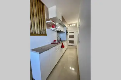 Cuisine ou kitchenette dans l'établissement Superbe Studio Le pavois
