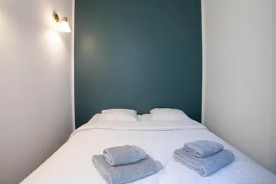Un ou plusieurs lits dans un hébergement de l'établissement Diamond Apartment