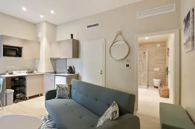 Cuisine ou kitchenette dans l'établissement Appartement des Anges - Welkeys