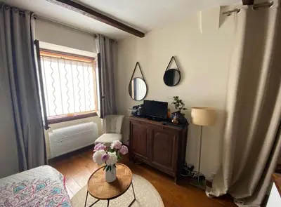 Un ou plusieurs lits dans un hébergement de l'établissement Studio au cœur du Vieil Antibes