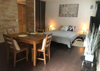 Un ou plusieurs lits dans un hébergement de l'établissement Studio Bijou Plage Antibes Juan-les-Pins