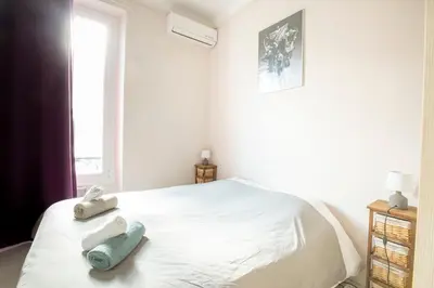 Un ou plusieurs lits dans un hébergement de l'établissement Cosy apartment 39M2, two steps from rue d'Antibes and Croisette