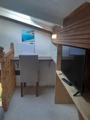 Télévision ou salle de divertissement dans l'établissement Garden Annexe 2