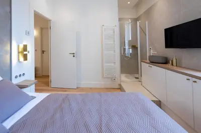 Un ou plusieurs lits dans un hébergement de l'établissement Luxury Apartment - Heart of Cannes - Rue d'Antibes