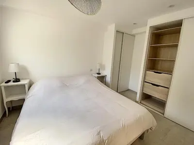 Un ou plusieurs lits dans un hébergement de l'établissement Superbe appartement au cœur du Cap d'Antibes