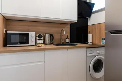 Cuisine ou kitchenette dans l'établissement Magniolias - Résidence Calme avec Piscine, Tennis & Jardin