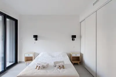 Un ou plusieurs lits dans un hébergement de l'établissement Appartement Maréchal - Welkeys